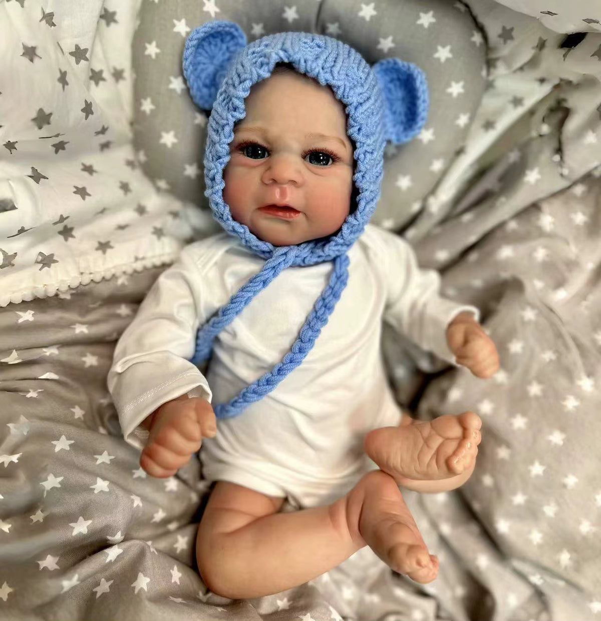 śpiące niemowlę z miękkim materiałowym korpusem 50 cm reborn