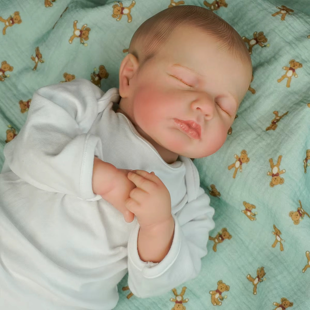 Lalka Reborn LouLou śpiące niemowlę z miękkim materiałowym korpusem