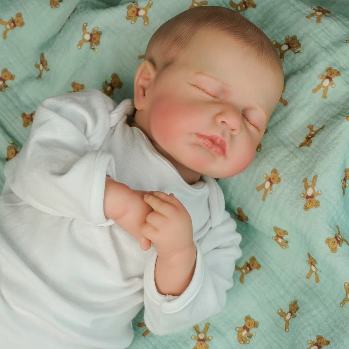 Lalka Reborn LouLou śpiące niemowlę z miękkim materiałowym korpusem