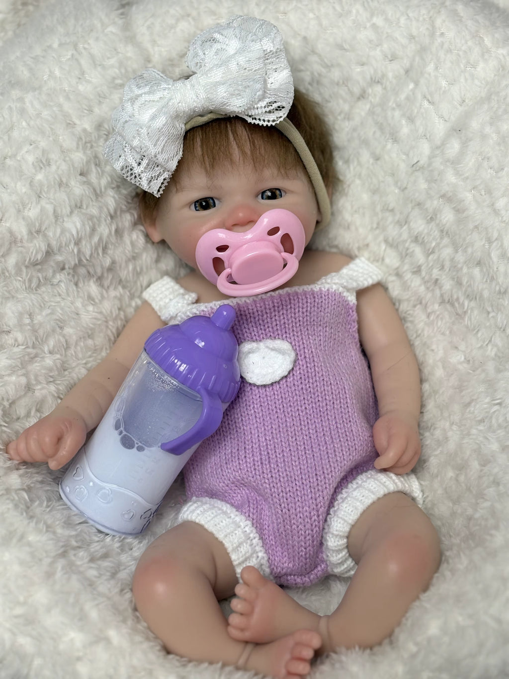 Lalka Reborn Vivienne 33 cm – brązowe włosy, pełne miękkie ciało silikonowe