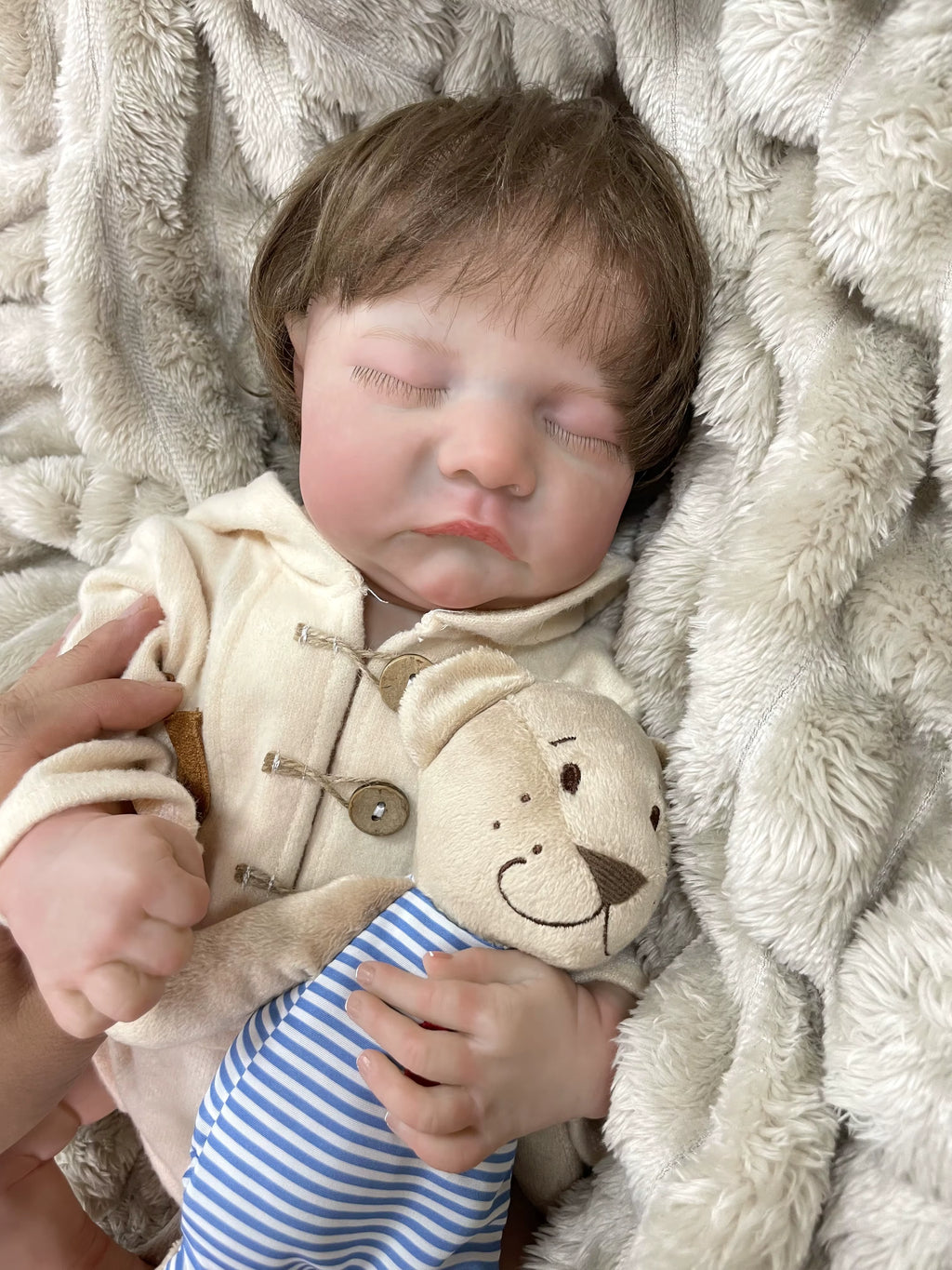 Lalka Reborn Riley 50 cm – realistyczne niemowlę z zamkniętymi oczami