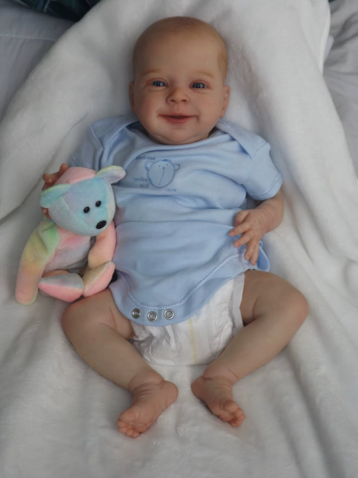 Lalka Reborn 48 cm – realistyczne niemowlę z miękkim materiałowym korpusem