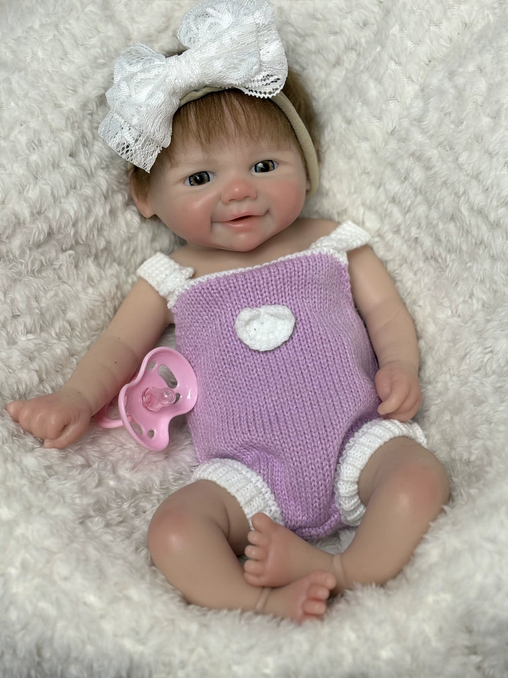 Lalka Reborn Vivienne 33 cm – brązowe włosy, pełne miękkie ciało silikonowe