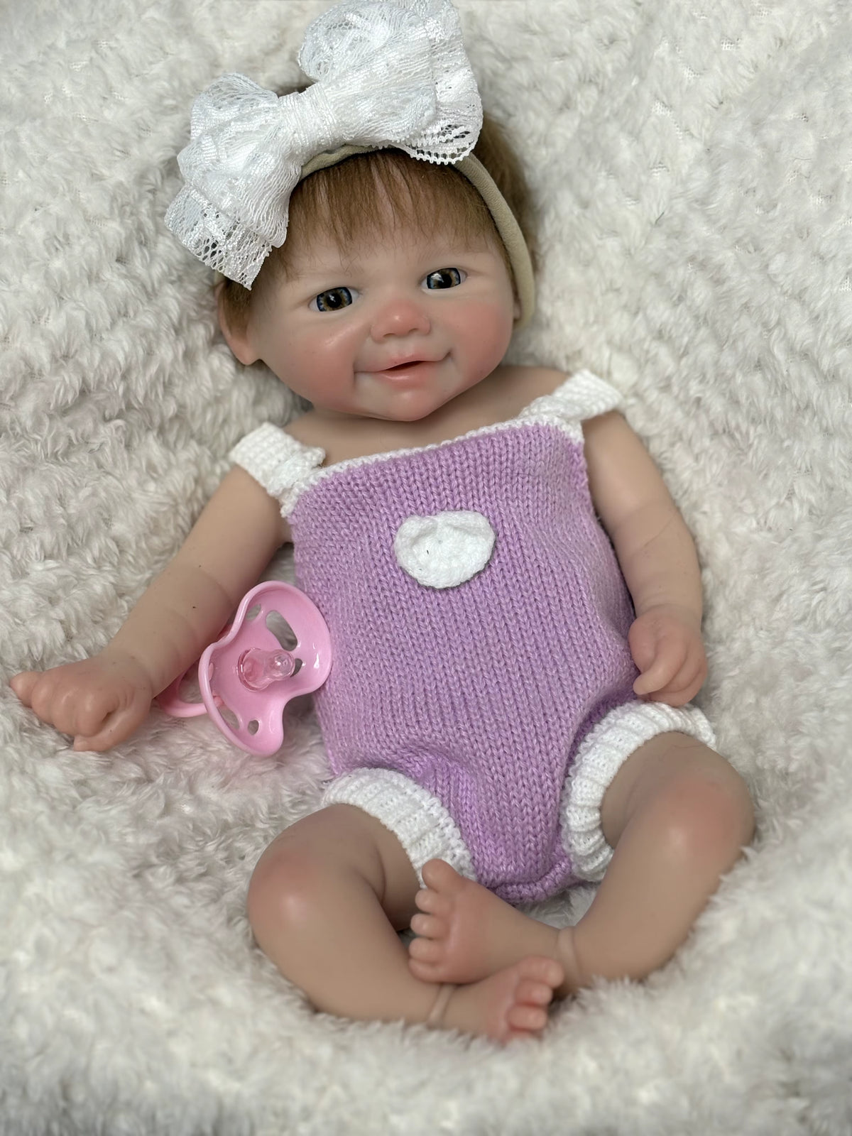 Lalka Reborn Vivienne 33 cm – brązowe włosy, pełne miękkie ciało silikonowe