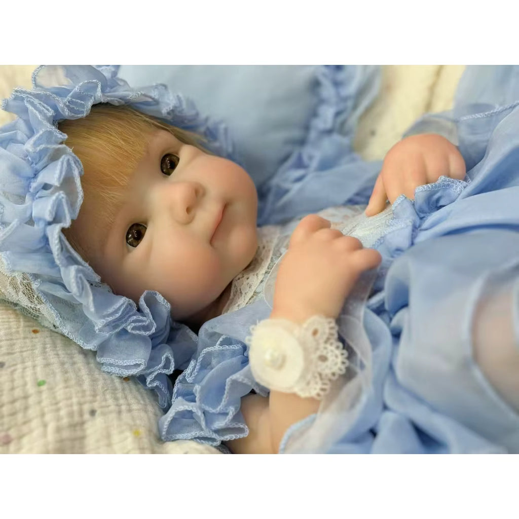 Lalka Reborn Bettie 46 cm – dziewczynka z miękkiego silikonu i włosami rooted