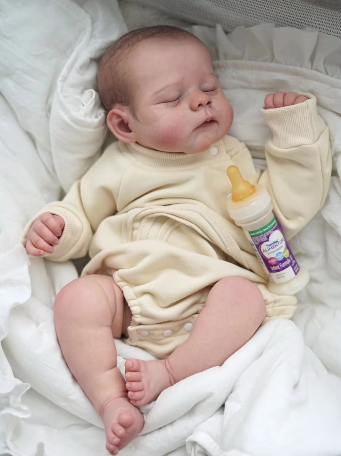 Lalka Reborn 50 cm – realistyczne niemowlę z miękkim materiałowym korpusem