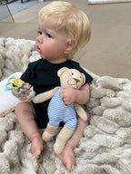 Lalka Reborn 55 cm – realistyczny chłopiec z niebieskimi oczami