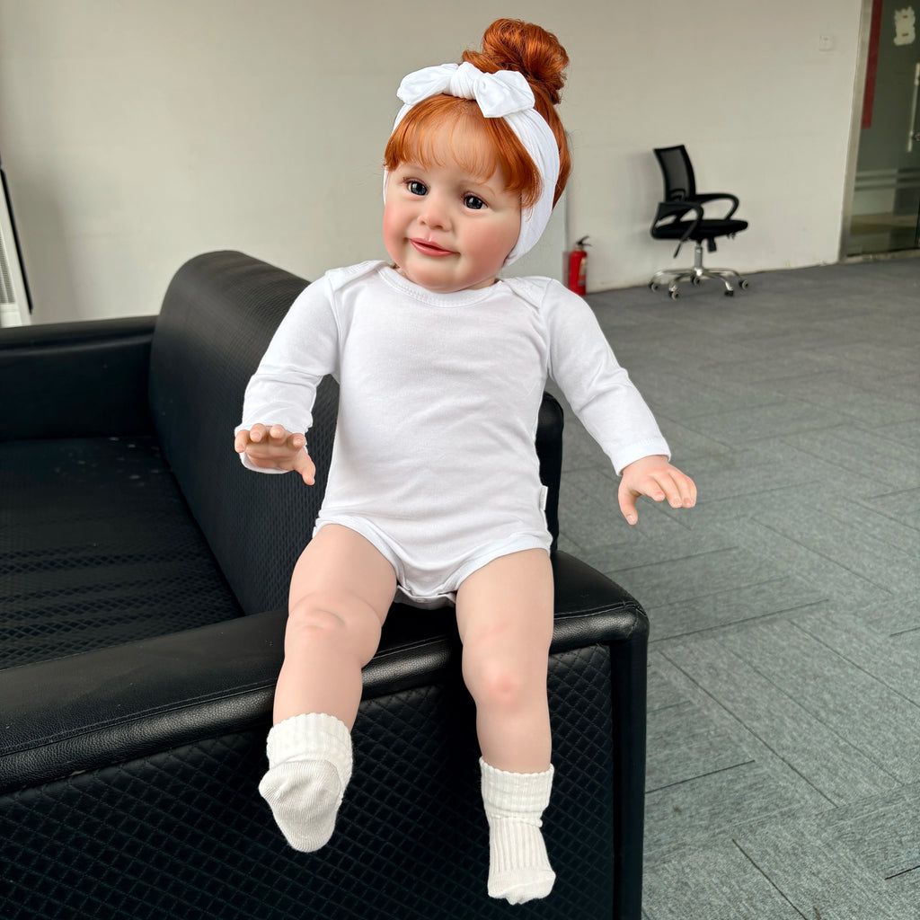 Zoe 66 cm – realistyczna lalka Reborn z kręconymi włosami