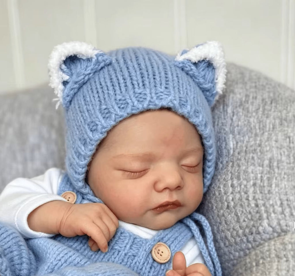 Lalka Reborn Sammy 45 cm – śpiące niemowlę z materiałowym korpusem